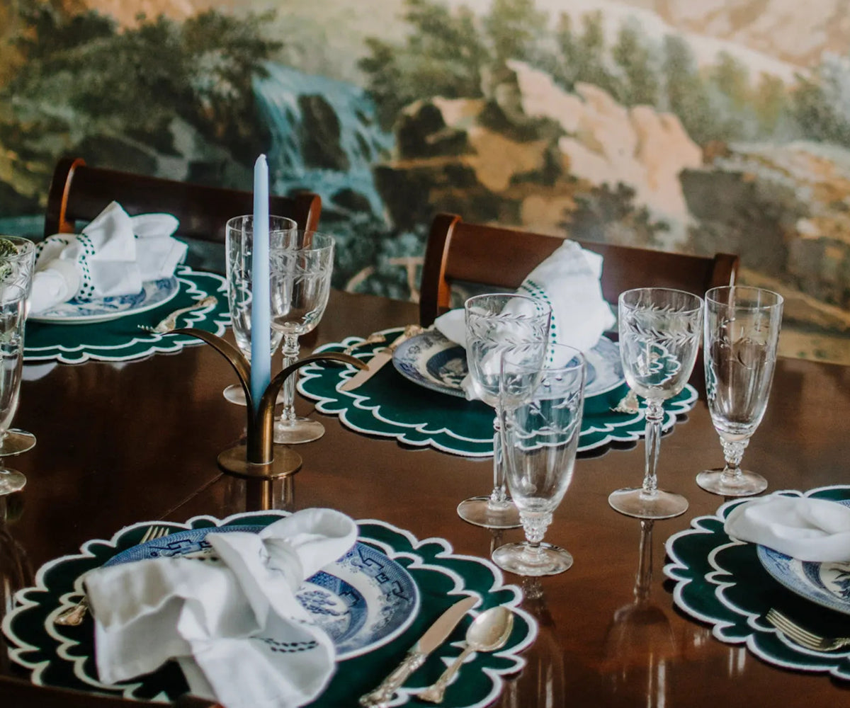 Green and white scalloped placemats with napkins