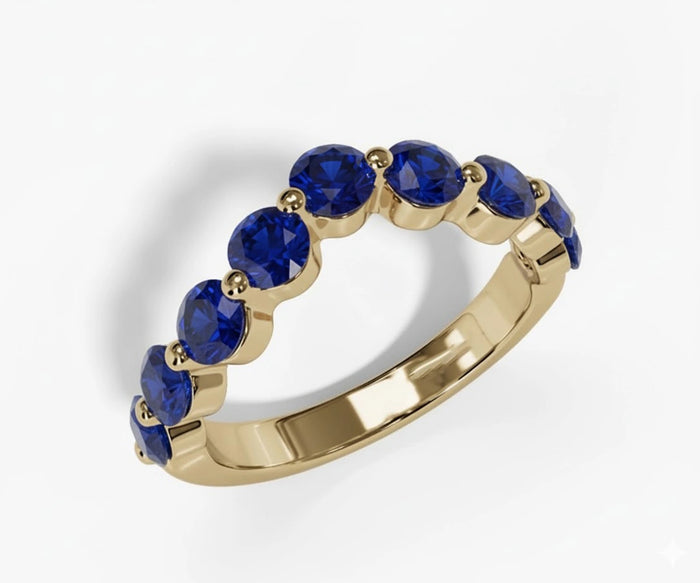 Elegant blue sapphire anniversary band with round cut gemstones