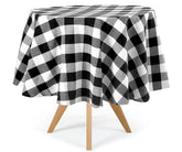 Black round tablecloth, a symbol of purity, creates a clean and timeless backdrop for your dining experiences.