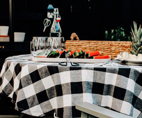 Round plaid tablecloth, a charming addition, infuses rustic appeal into your dining decor with its classic pattern.