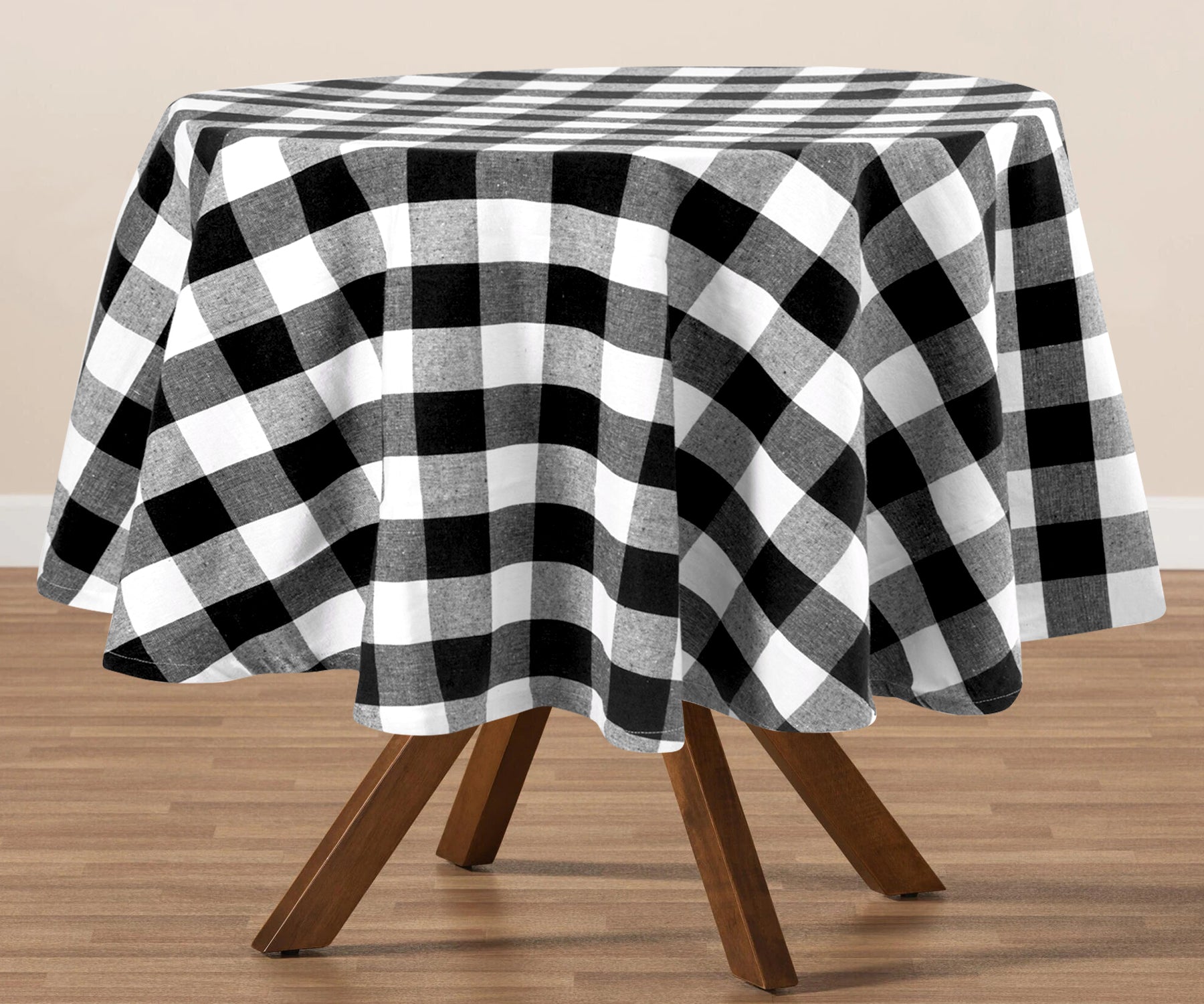 Black cloth tablecloth, a charming addition, infuses rustic appeal into your dining decor with its classic pattern.