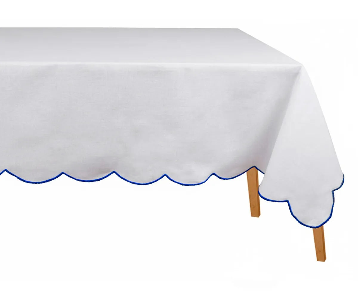 Classic white cotton tablecloth with blue scalloped embroidery — crisp, elegant, and durable table linen that adds charm to any dining space. Machine-washable embroidered rectangle tablecloth for daily or event use.
