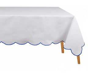 Classic white cotton tablecloth with blue scalloped embroidery crisp, elegant, and durable table linen that adds charm to any dining space. Machine washable embroidered rectangle tablecloth for daily or event use.