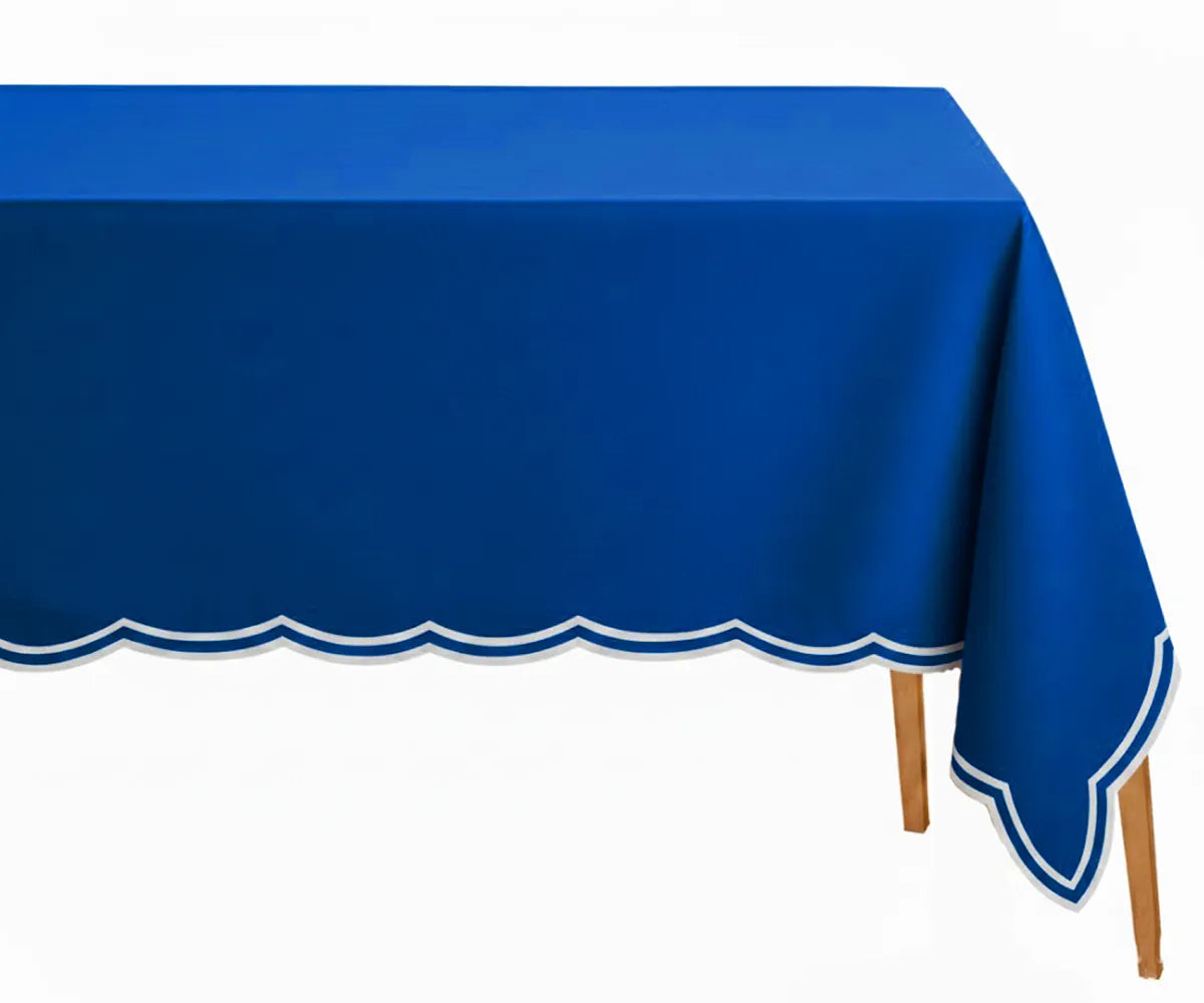 Royal blue cotton rectangle tablecloth with delicate white scalloped embroidery, soft and durable, perfect for elegant dinners, celebrations, and festive gatherings.
