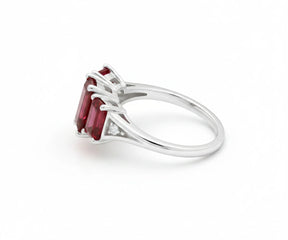 Red gemstone ruby ring with zircon accents in stylish design