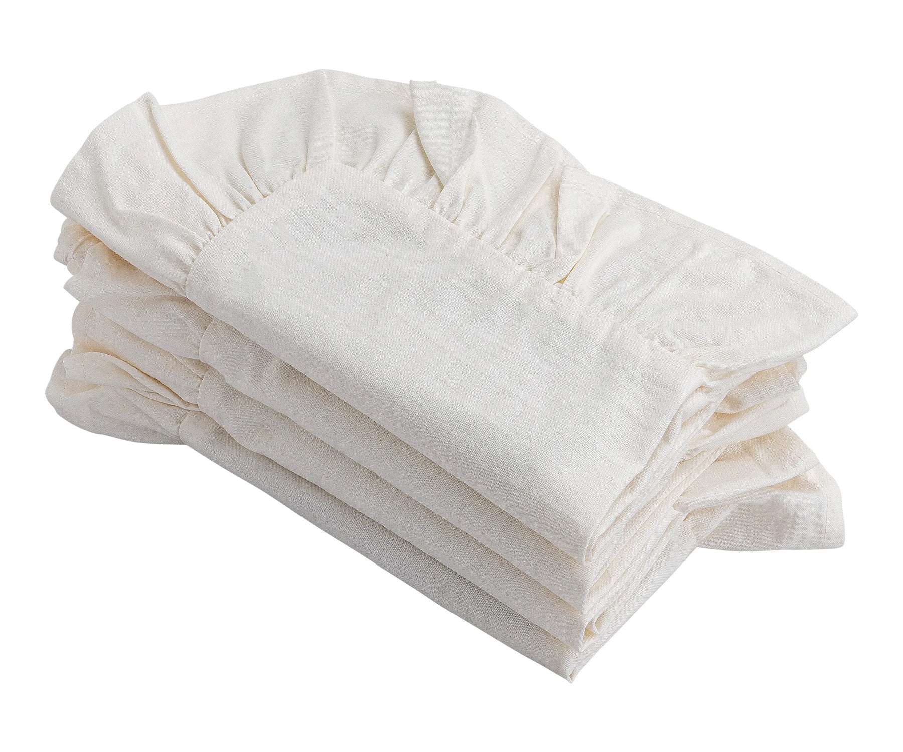 Set of 4 ruffled napkins in natural color, paired with a farmhouse tablecloth.
