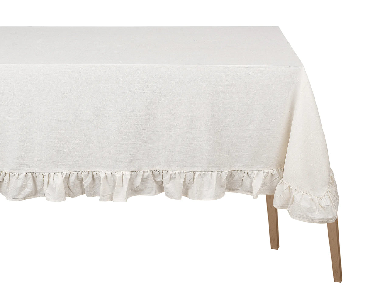 Natural cotton ruffle trim tablecloth on farmhouse dining table