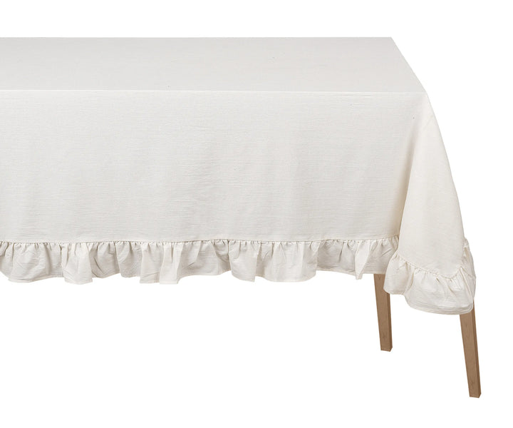Natural cotton ruffle trim tablecloth on farmhouse dining table