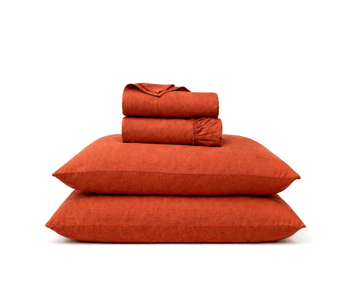 Rust-colored European flax linen bedding set with breathable linen sheets and pillowcases