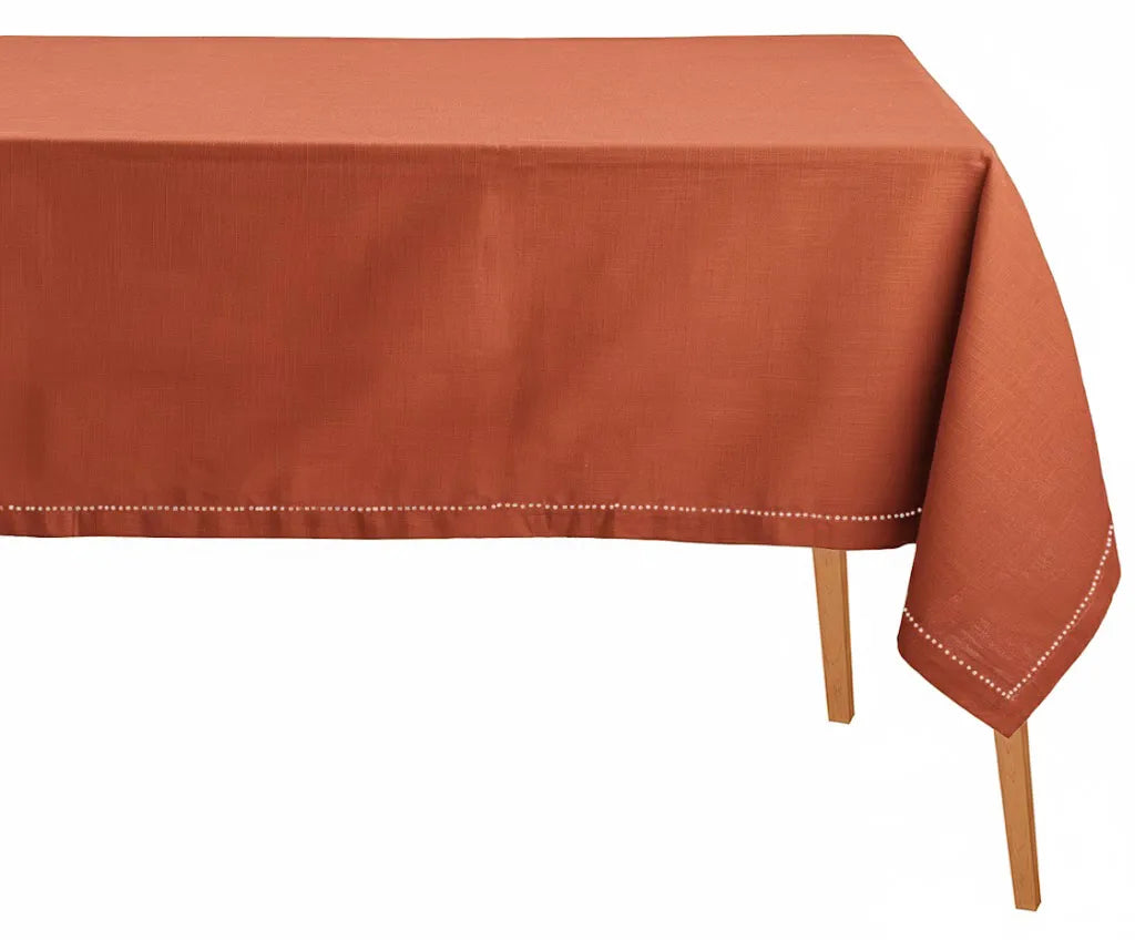 Rust hemstitch cotton tablecloth for rectangular dining tables, elegant 100% cotton fabric perfect for weddings, holidays, and everyday décor.
