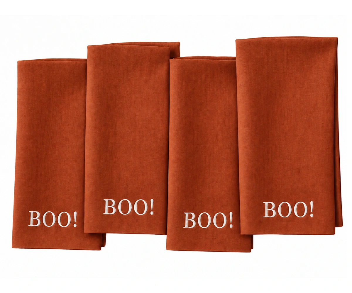 Rust Halloween cloth napkin with BOO design for fall and Halloween table decor Reusable table napkin for Halloween dinner parties, autumn gatherings, seasonal dining, and entertaining