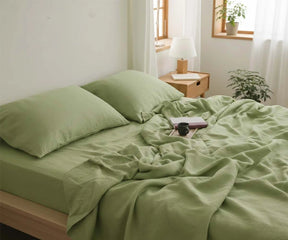 Sage green linen sheet set made from 100% European flax linen with fitted sheet, flat sheet, and pillowcases for breathable everyday bedding