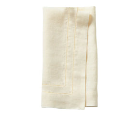 Sand Linen Hemstitch Napkins neatly folded on a dinner table setup – 100% linen napkins for weddings and events