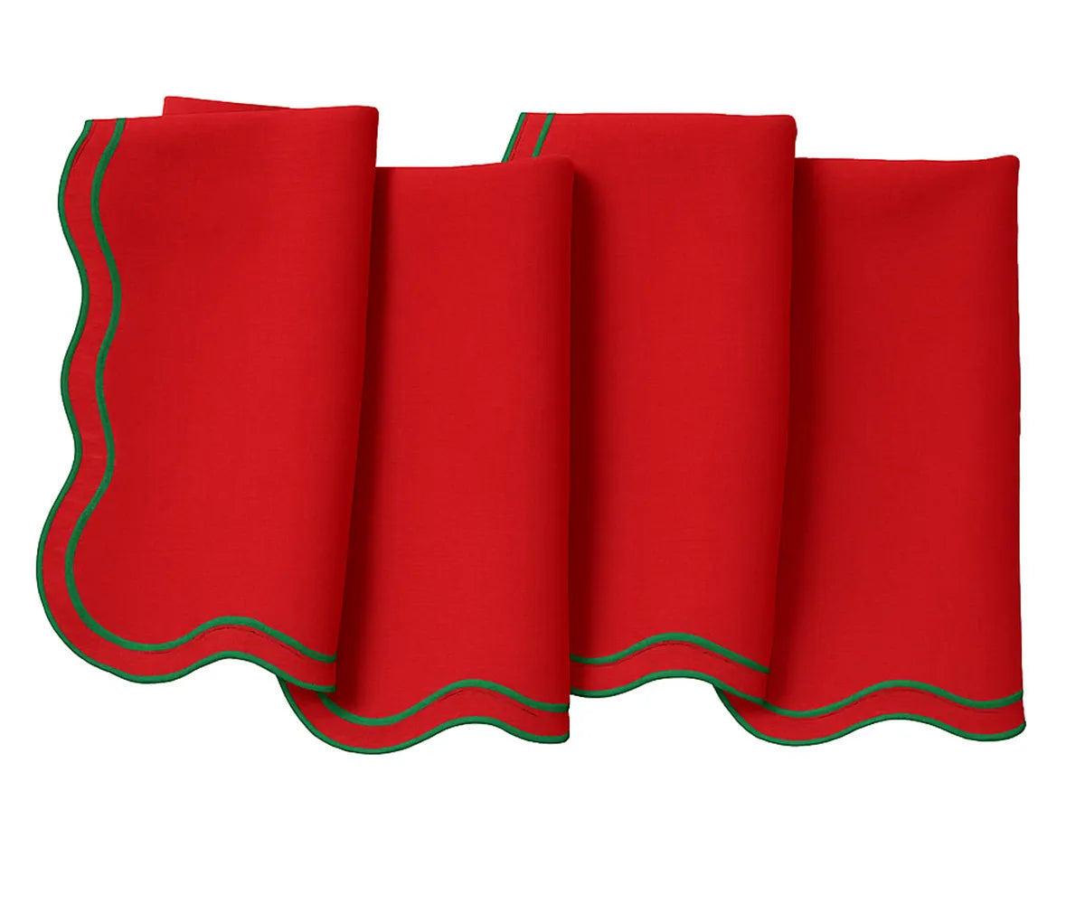 Festive red and green scalloped cotton napkins made from 100% cotton. Soft, durable, and reusable—perfect for holiday dinners and events.