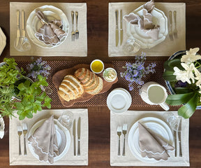 Beige scallop napkins set with earthy-toned dinnerware
