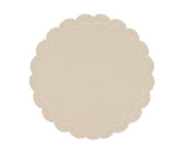 Elegant beige round scalloped placemats for dining table décor