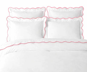 Elegant pink cotton scalloped bedding set with decorative borders