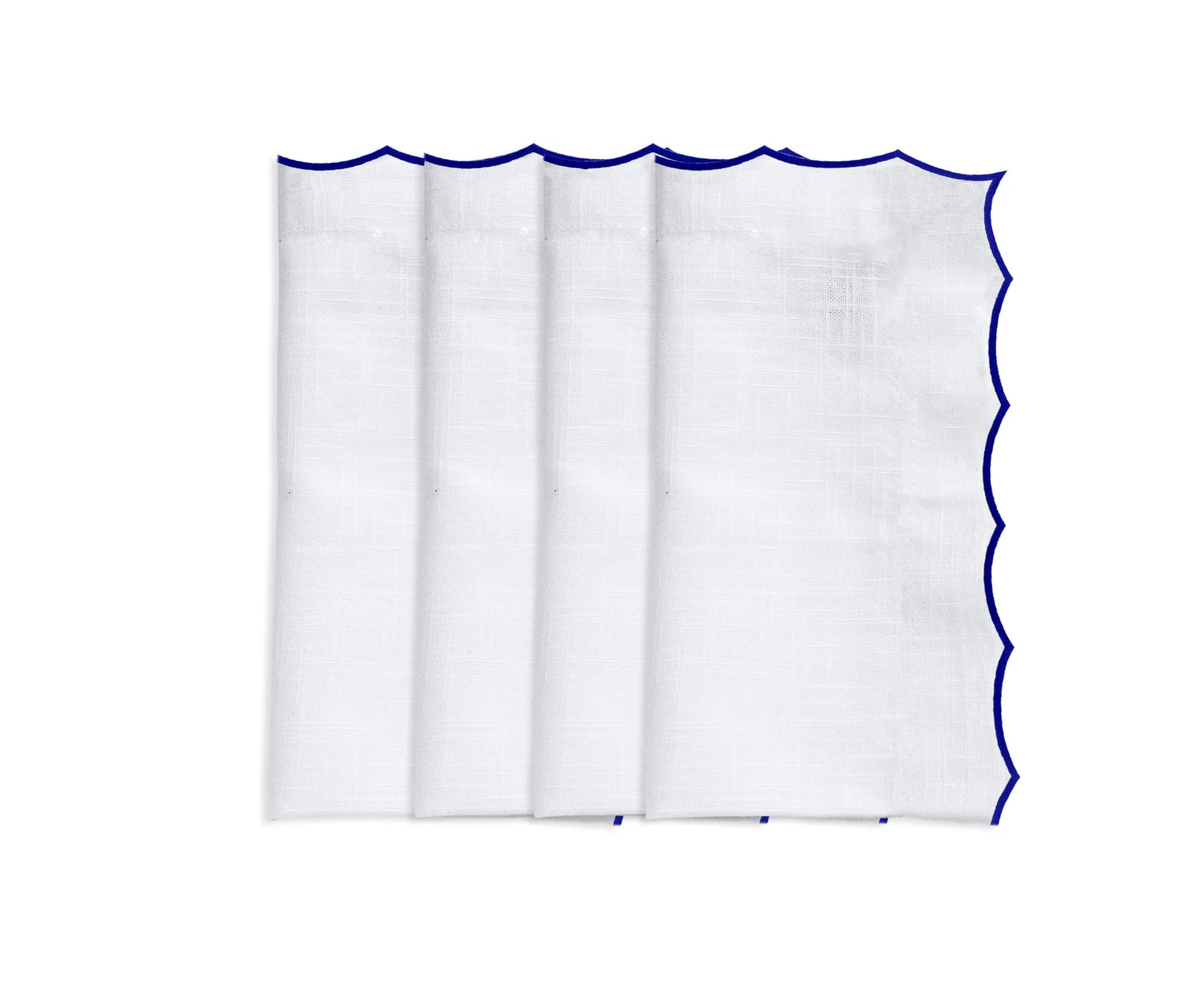 Eco-friendly cotton napkins with elegant embroidery, ideal for upscale table styling.