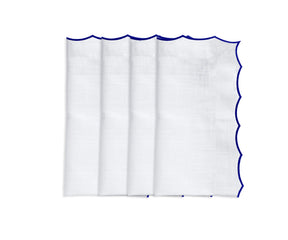 Eco-friendly cotton napkins with elegant embroidery, ideal for upscale table styling.