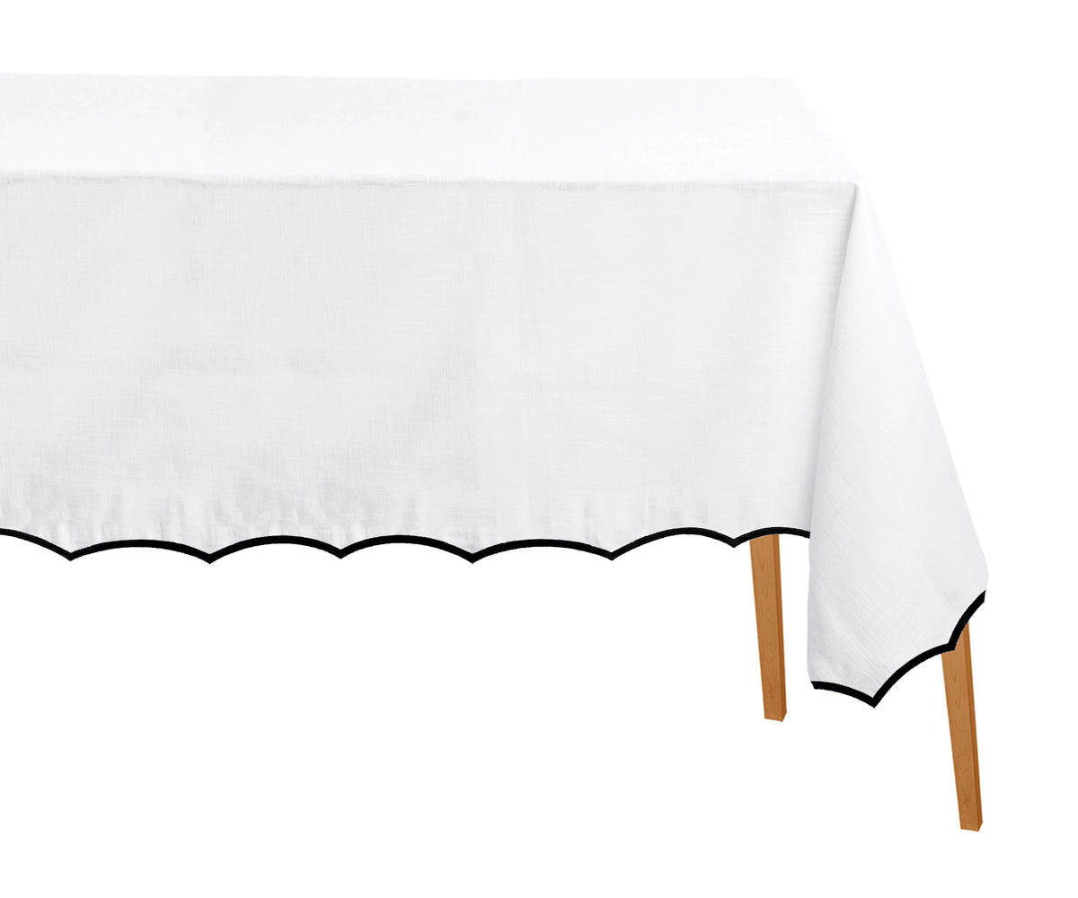 white fabric tablecloth with scalloped edge and black border, perfect for weddings and formal dining.