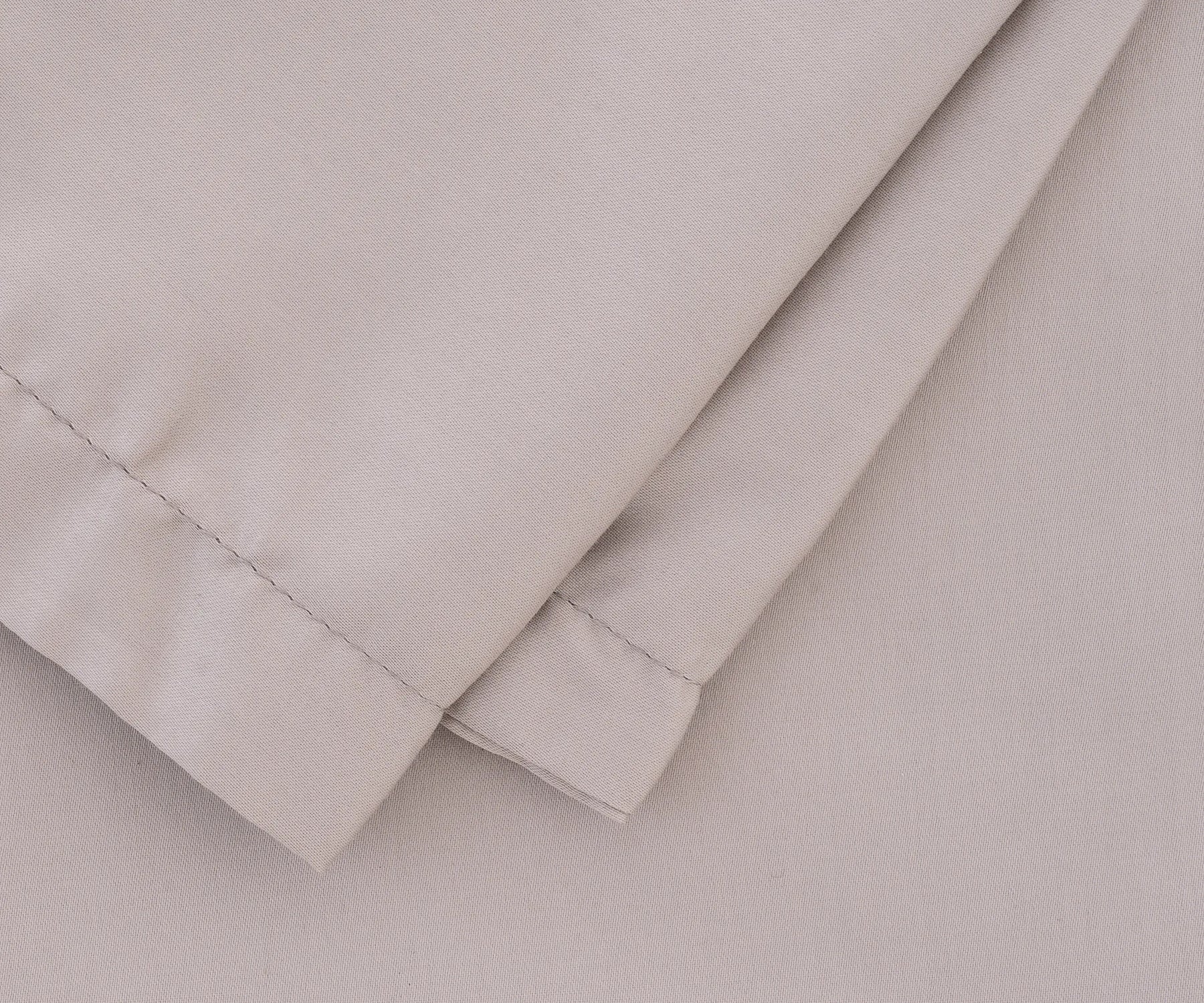 Set of two brown pillowcases in standard, queen, and king sizes, durable stitching, machine washable, elegant bedroom bedding
