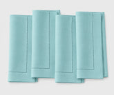 Sky blue 100% cotton hemstitch cloth napkins with elegant stitched border, reusable washable dinner napkins for weddings, restaurants, Thanksgiving, parties, and everyday dining, available in 18x18, 20x20, and 22x22 inch sizes.