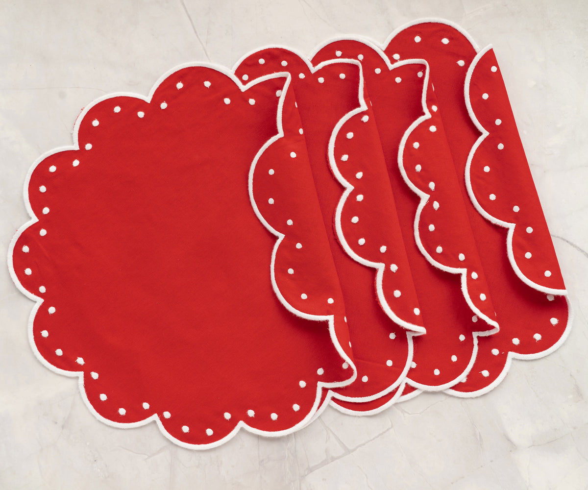 Decorative scalloped table placemat made from 100% cotton, featuring intricate stitched accents for a refined and classic dining presentation.