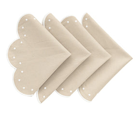 Set of four beige cotton placemats with scalloped edges