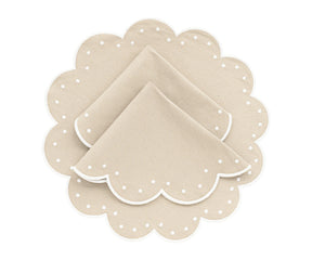 Elegant polka dot placemat close-up with stitched scallop detail