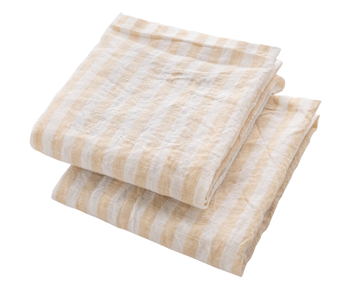 Immerse yourself in the plush embrace of our thick striped linen towel, a statement piece that combines elegance and functionality for a truly refined bathing ritual.