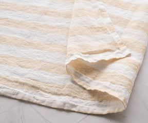 Add a touch of style to your bathroom with our striped linen towel, a chic accent that complements your decor effortlessly.