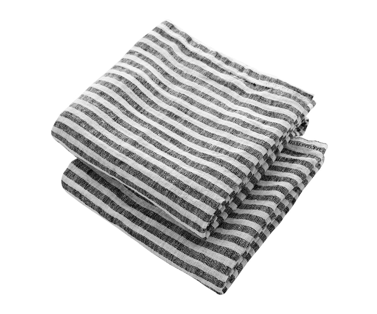 Add a dash of style to your space with our striped linen towel, a chic accent that complements any bathroom or kitchen.