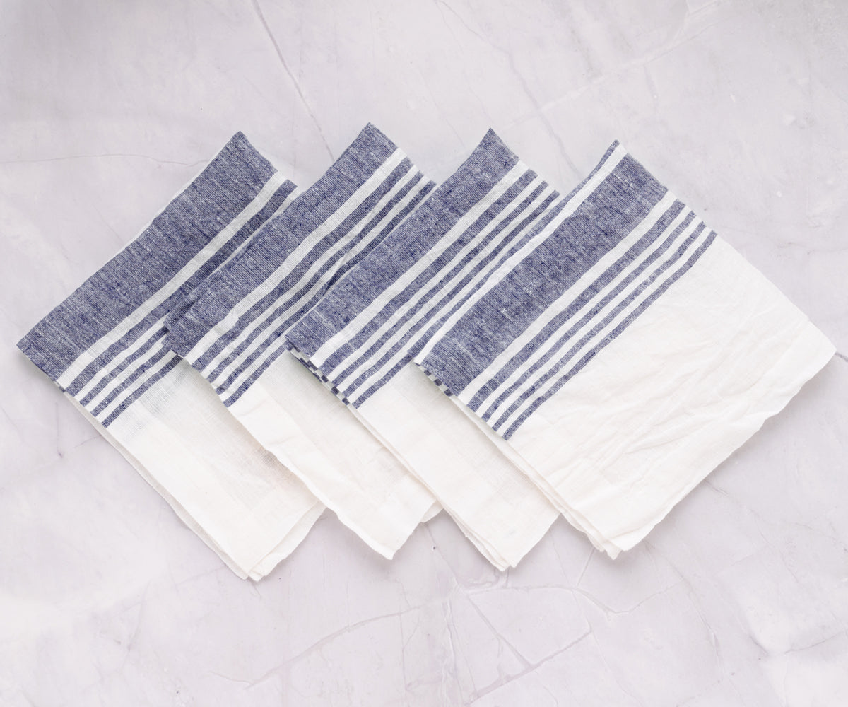 Quartet of blue and white striped linen dinner napkins