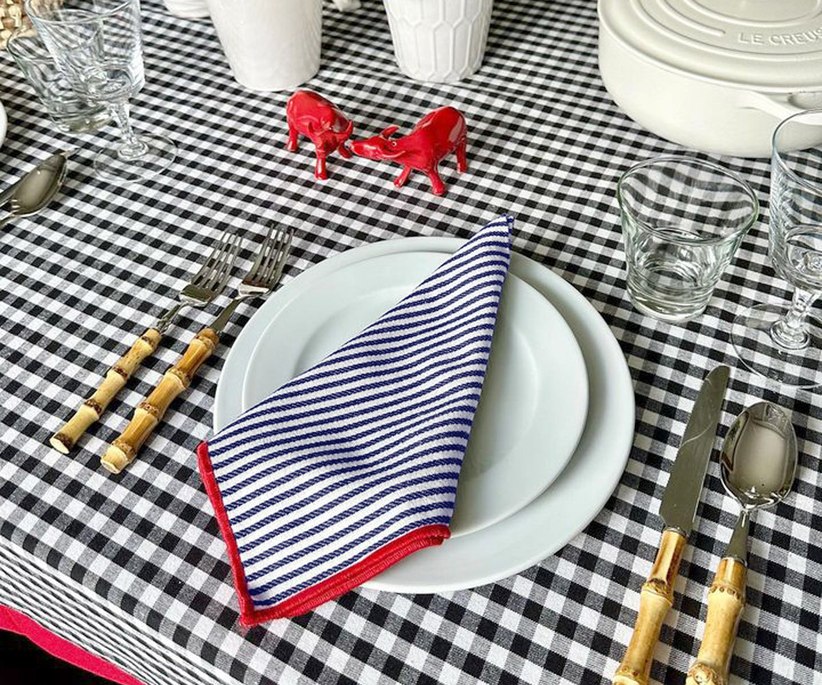 Farmhouse napkins can be easily mixed and matched with solid-colored.