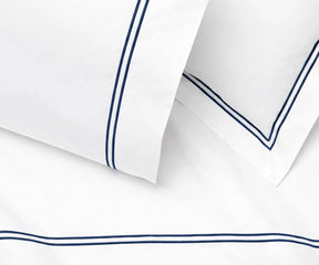 navy hotel style flat sheet embroidered cuff cotton percale crisp elegant bedding set