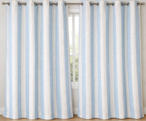 Blue and white striped curtains hanging in living room