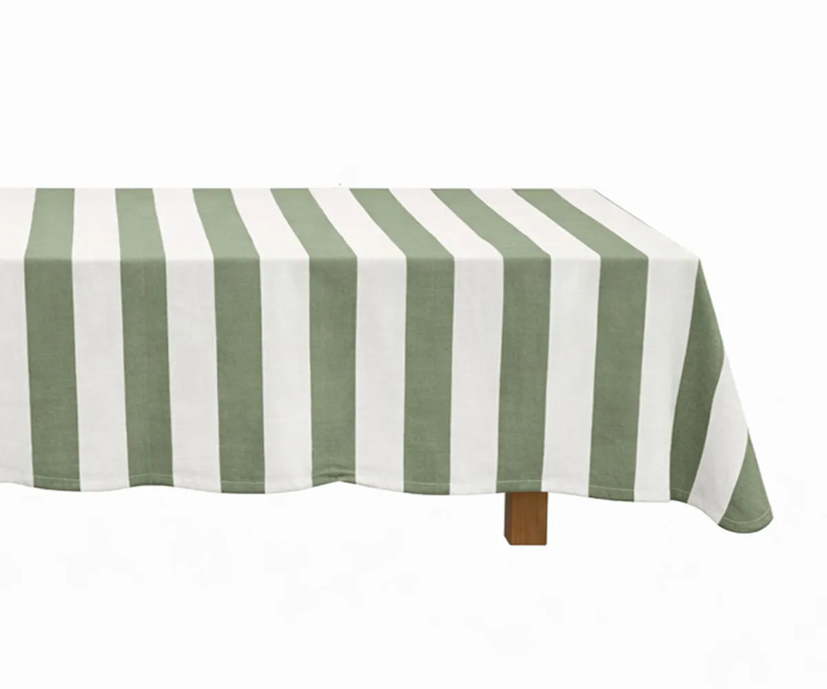 Cabana stripe cotton linen rectangle tablecloth laid on a rectangular dining table, highlighting a soft textured fabric and timeless design