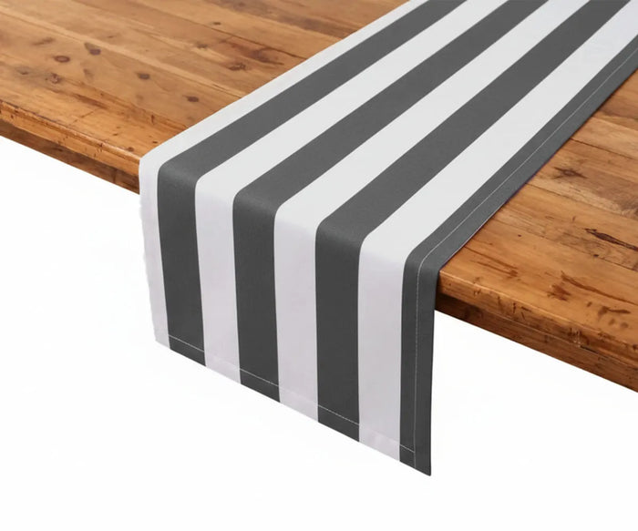 Charcoal and white cabana stripe table runner in a durable cotton linen blend, ideal for modern farmhouse table decor and elegant dinner parties. This striped table runner delivers bold contrast and a tailored finish for holiday table styling, formal dining setups, and everyday use. Washable, reusable, and designed for long-lasting performance.