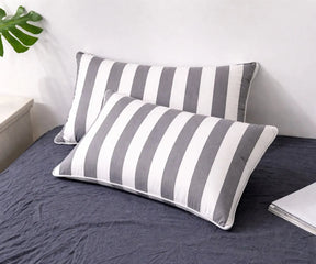 Striped cotton linen blend pillowcase styled for a clean and relaxed bedroom look