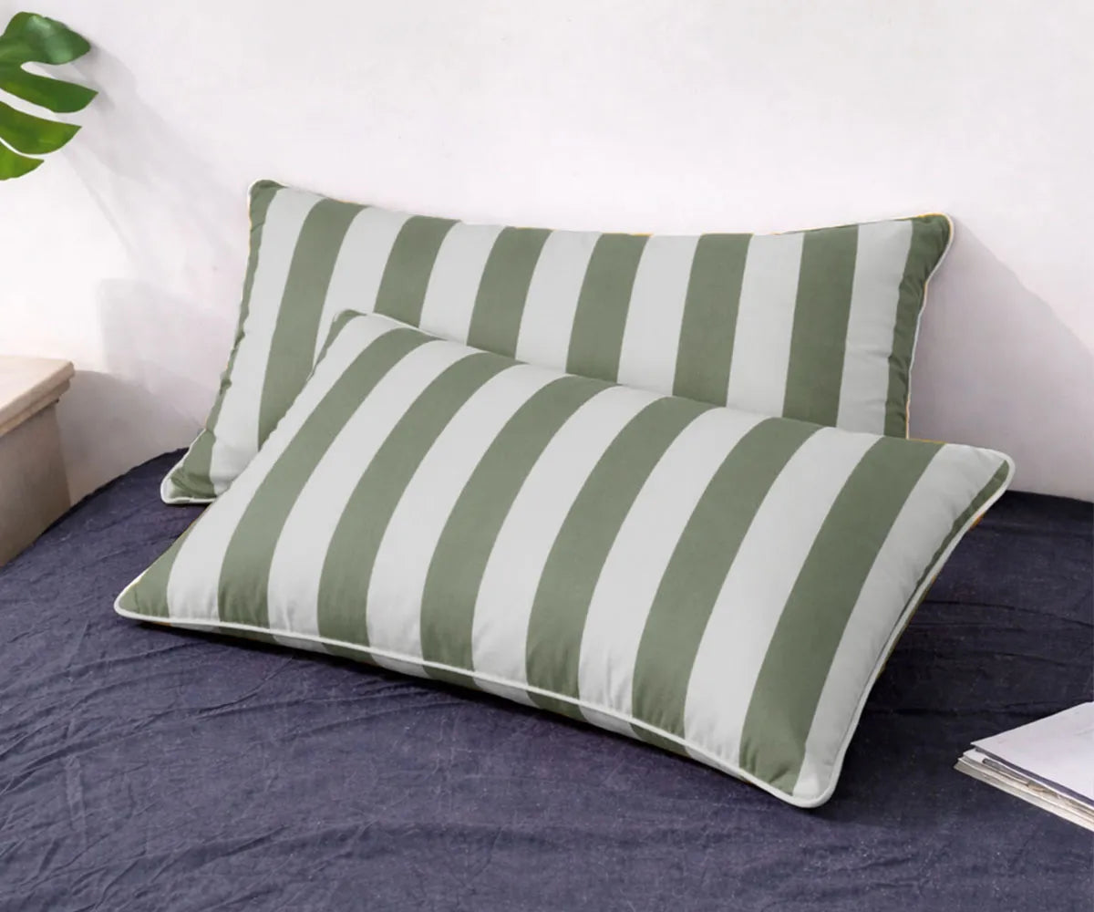 Premium striped pillowcase covers made from a soft yet durable cotton linen fabric, delivering comfort and refined bedding style. The classic cabana stripe pattern enhances resort-inspired bedrooms and contemporary decor