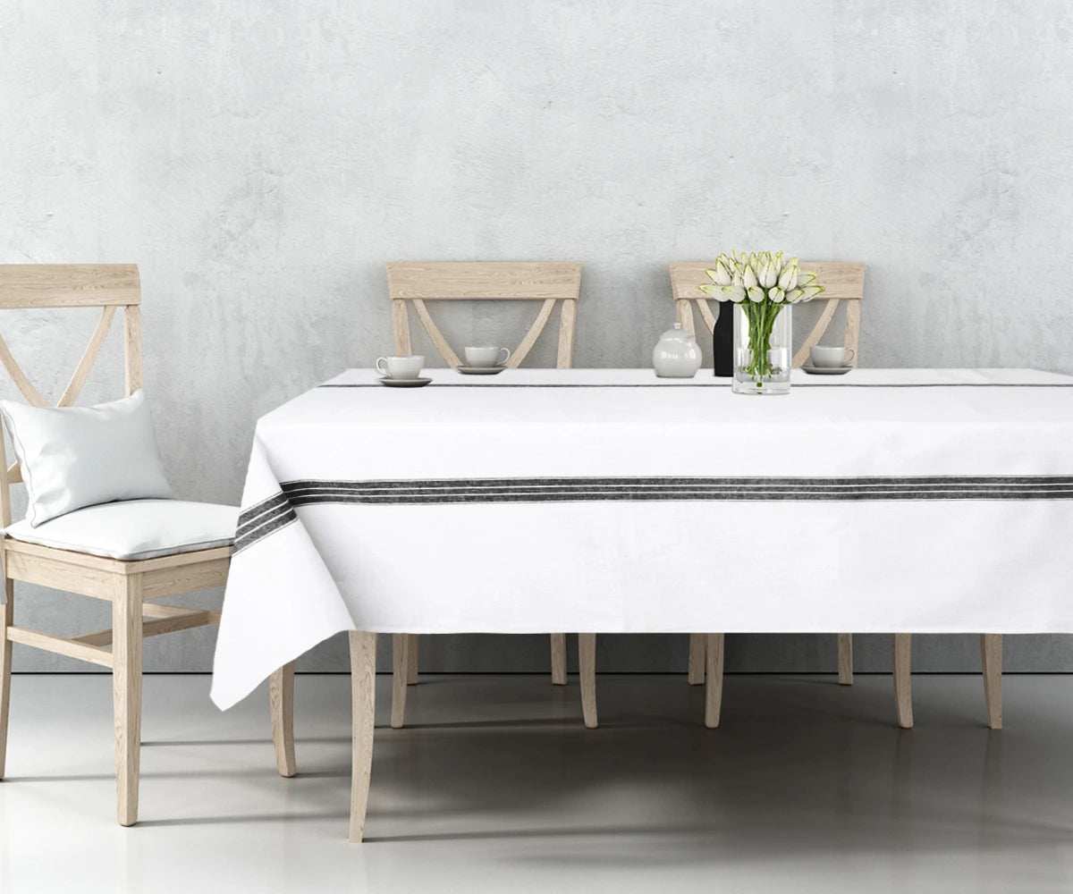Minimalist cotton tablecloth with bold black stripes for dining table setup