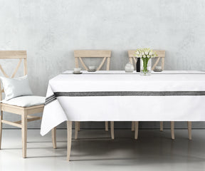 Minimalist cotton tablecloth with bold black stripes for dining table setup