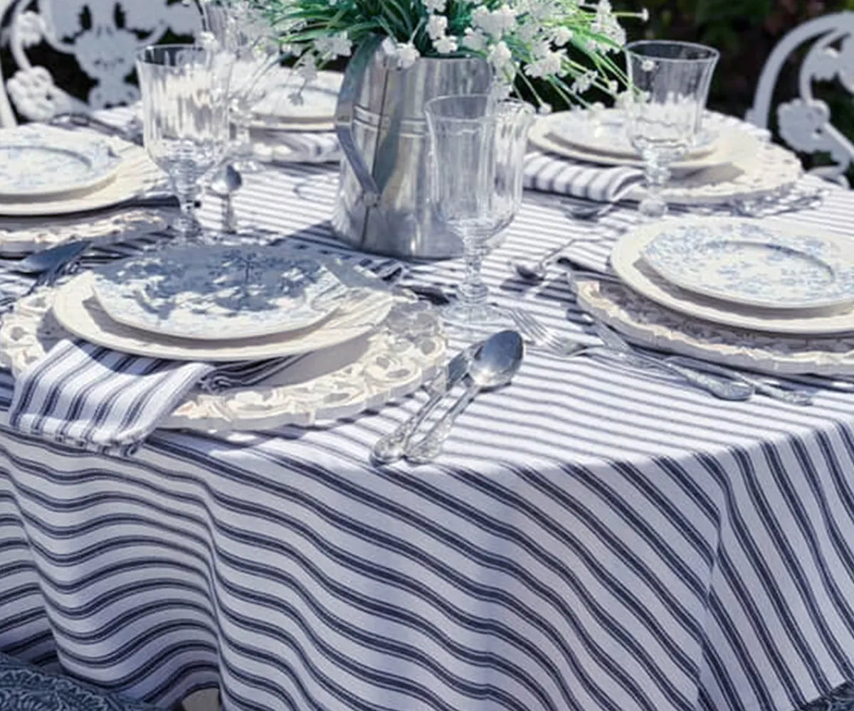 Elegant cotton tablecloth with navy blue stripes and crisp white contrast