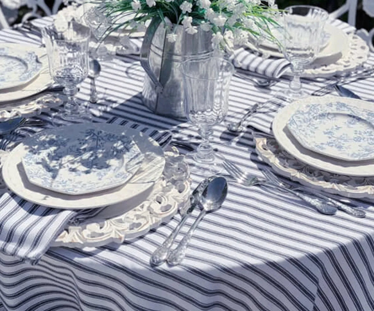 Navy blue and white striped cotton rectangle tablecloth on dining table