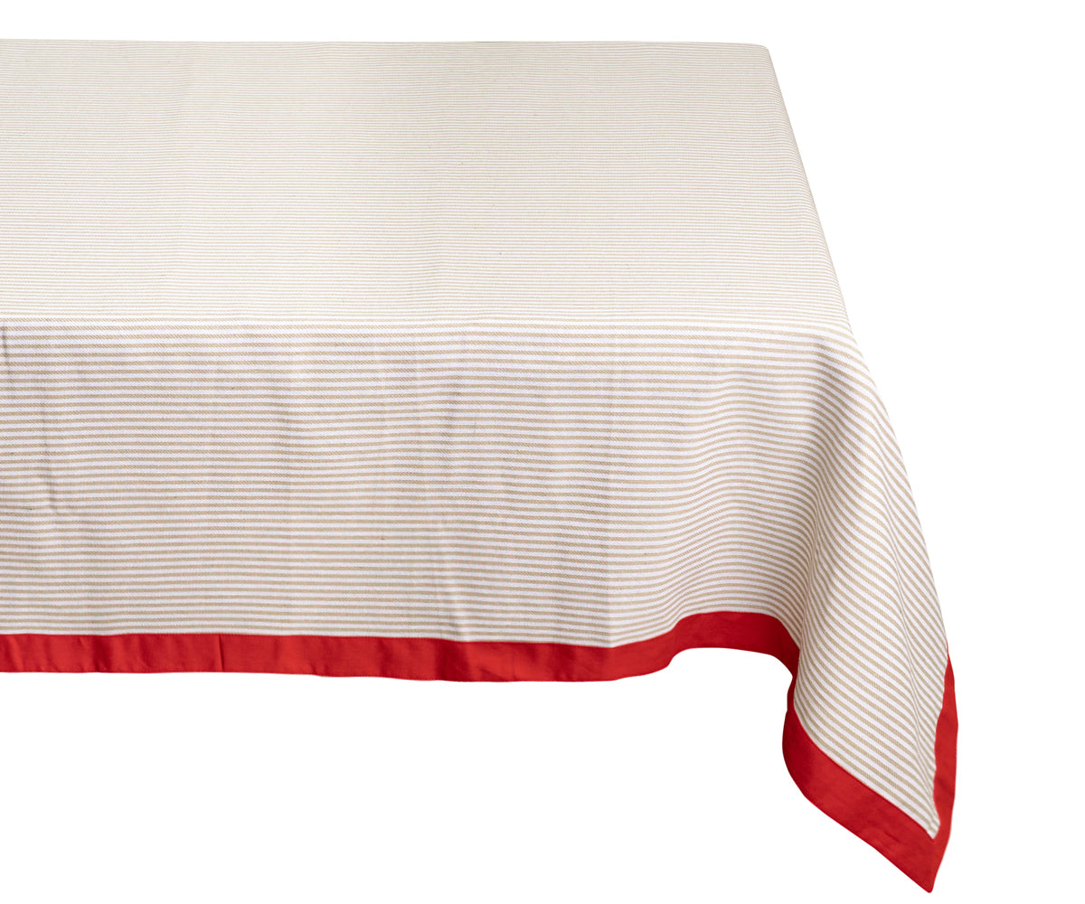 Beige tablecloth complemented by a red color border, creating a timeless dining room ambiance.