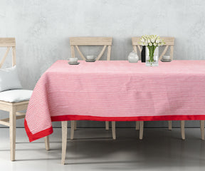 Res Striped tablecloth Featuring stripes as the prominent pattern, adding visual interest and style to the table setting.