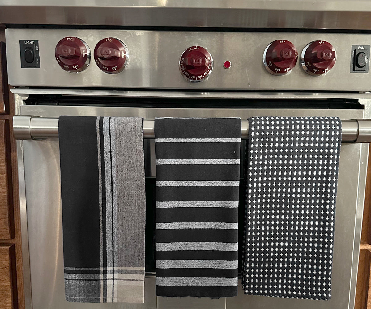 Stylish kitchen towels in a serene shade of blue, enhancing your culinary space.