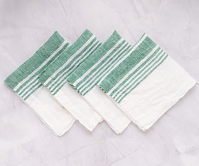 Vibrant spring napkins adorned with floral motifs, perfect for celebrating the season's renewal
