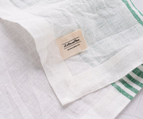 Elegant green linen napkins, crafted from premium fabric for a sophisticated touch to your table setting.