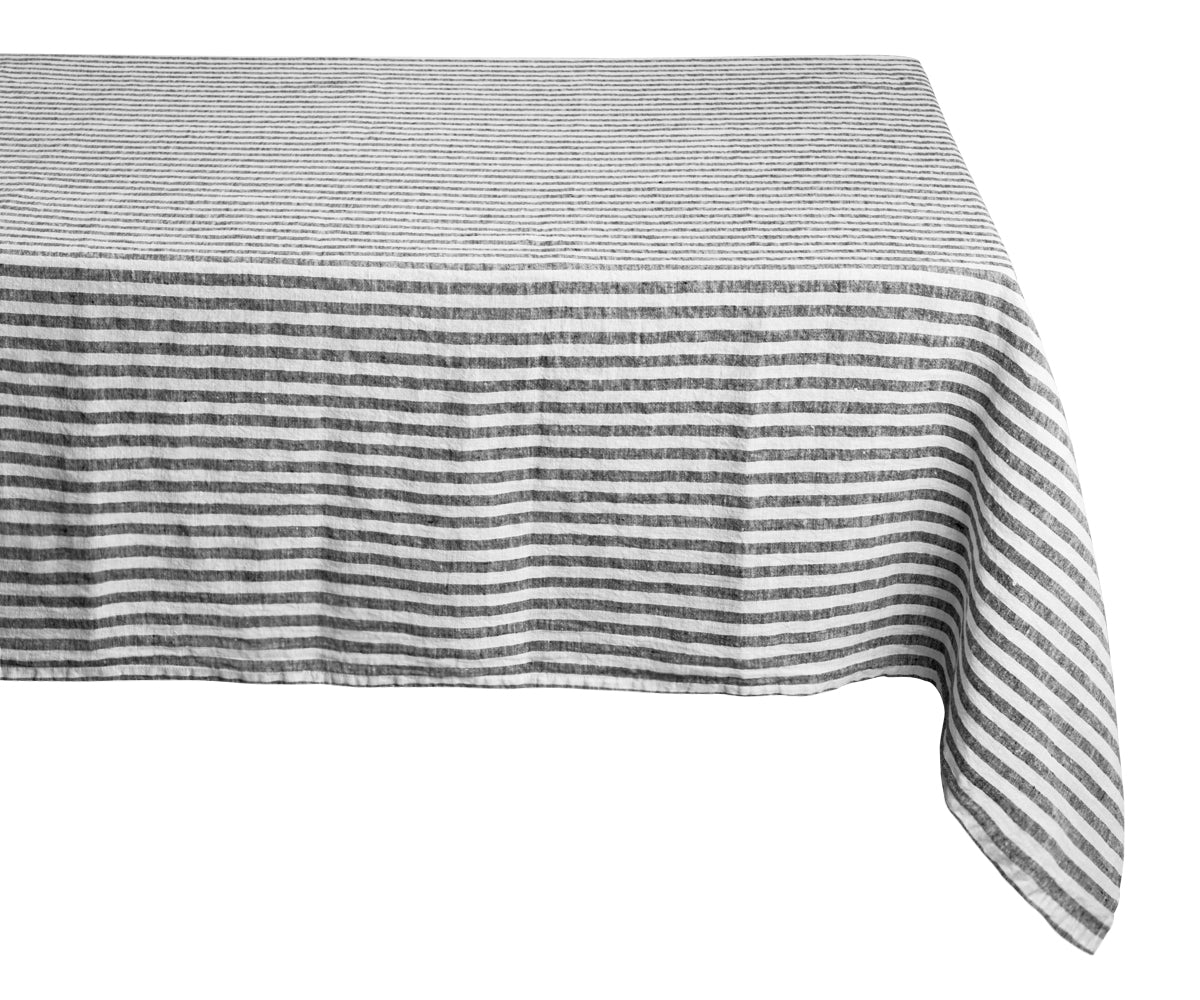 A refined white linen tablecloth for sophisticated gatherings.